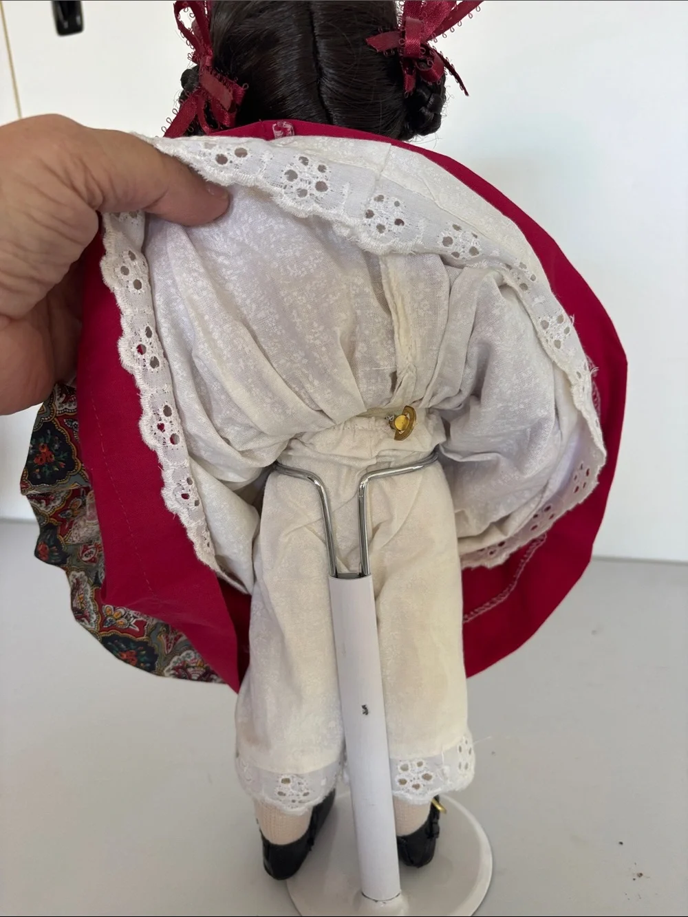 Collectible musical porcelain doll by Paradise Galleries or similar maker.